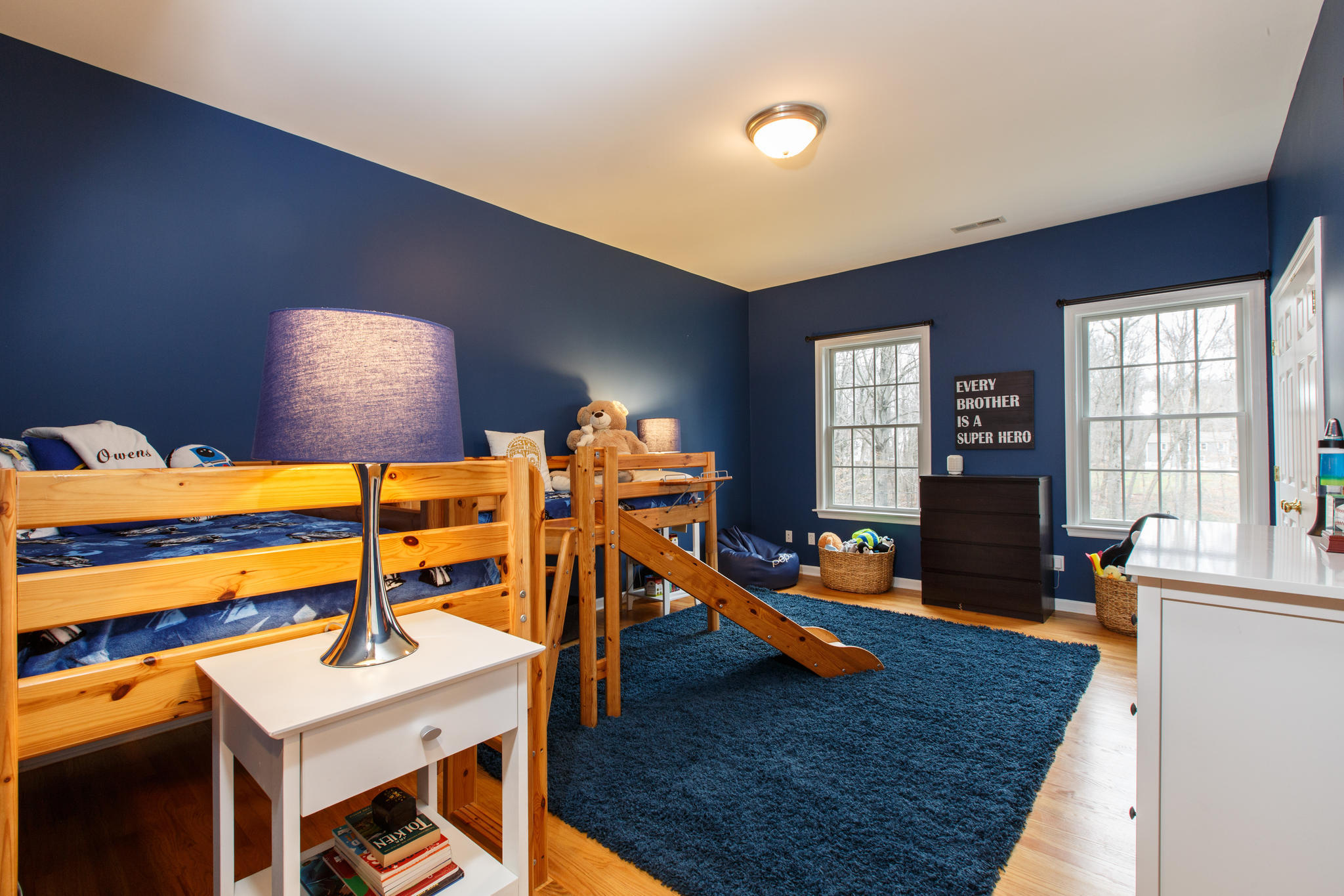 54 Rocky Brook Road New Canaan, CT 06840 - Photo 19 of 25 a room with gym equipment and a wooden floor