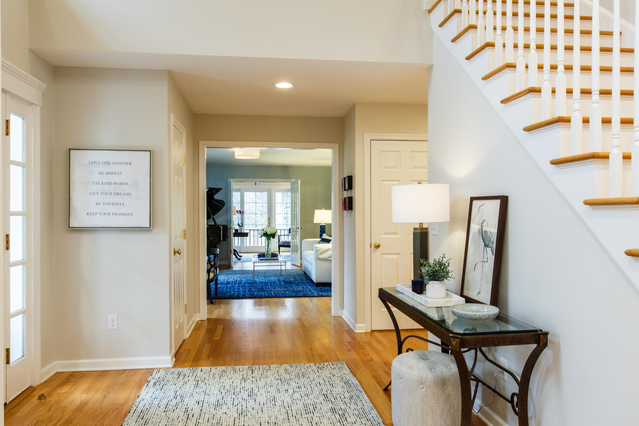 54 Rocky Brook Road New Canaan, CT 06840 - Photo 4 of 25 a living room with furniture and a wooden floor