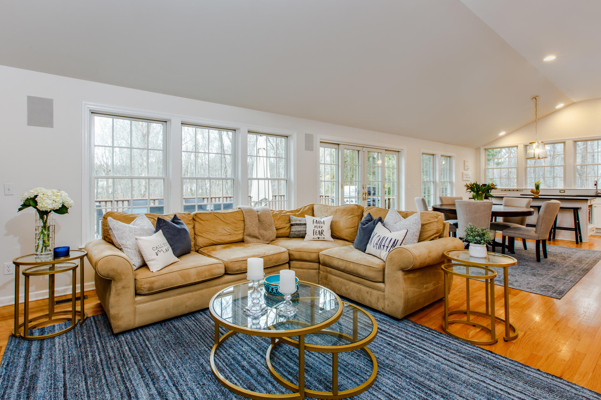 54 Rocky Brook Road New Canaan, CT 06840 - Photo 10 of 25 a living room with furniture wooden floor and a large window