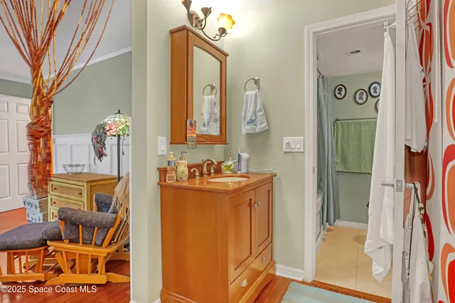 a view of living room with furniture and a fireplace
