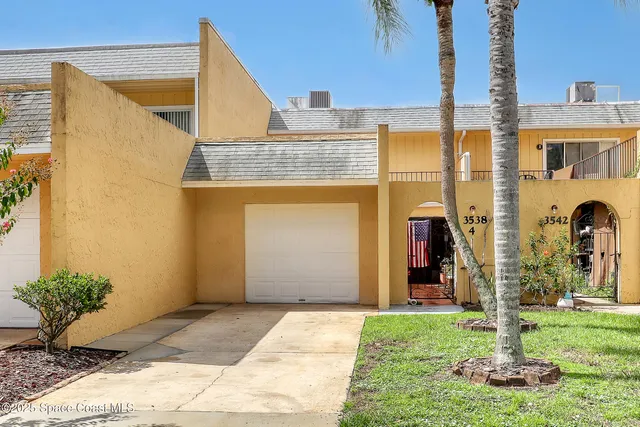 a view of building with glass windows