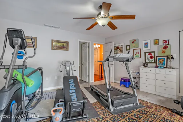 a room with furniture and wooden floor