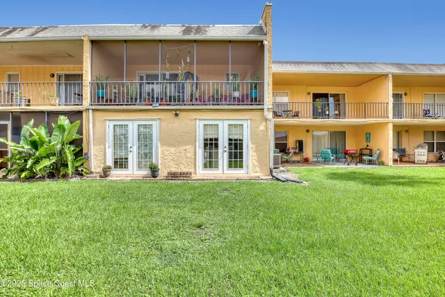 front view of a building with a yard