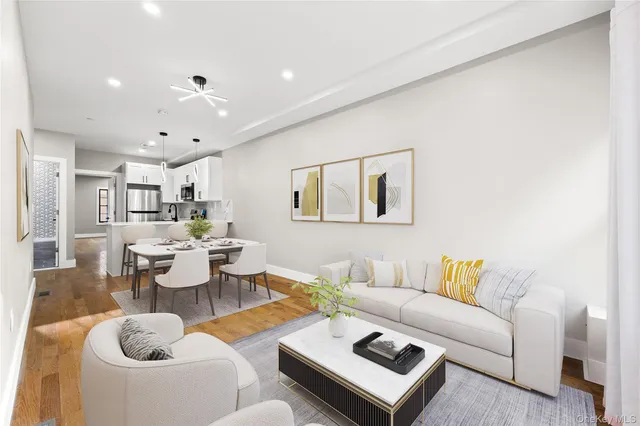 a living room with furniture and a table