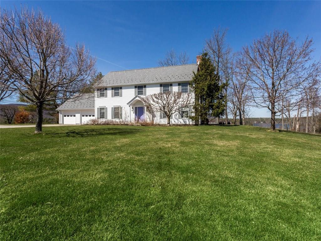 129 Taconic Road Salisbury, CT 06068 - Photo 1 of 1 a view of a white house with a big yard and large trees
