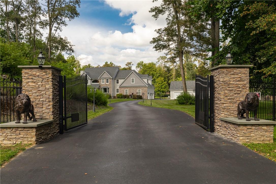 a view of a street with brick building in the background