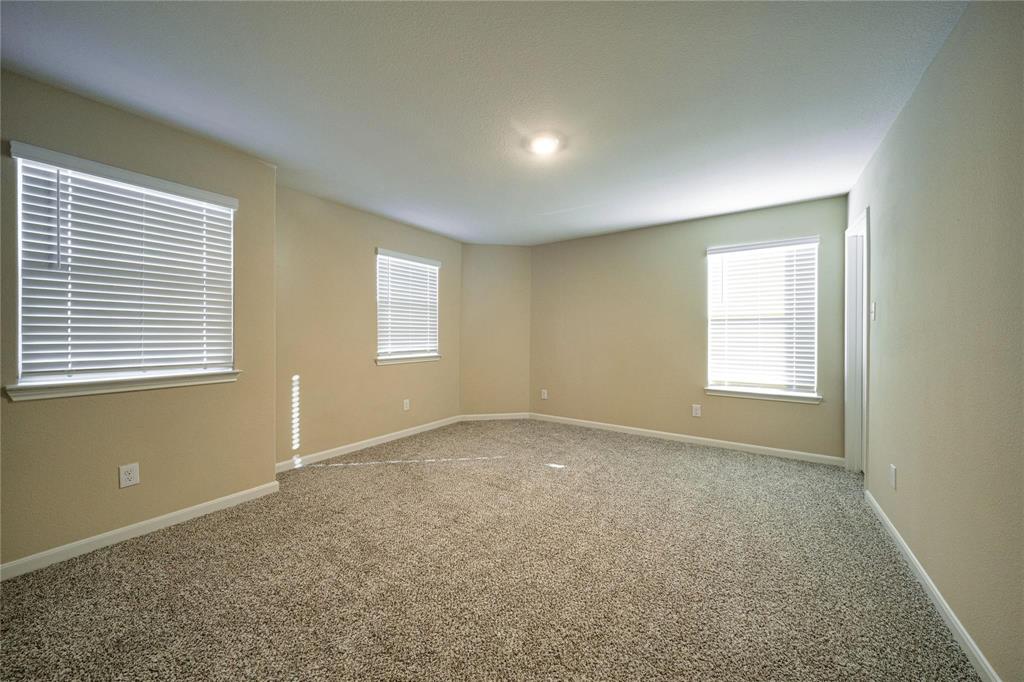 274 Honeysuckle Lane Princeton, TX 75407 - Photo 20 of 35 Spare room with carpet flooring and baseboards