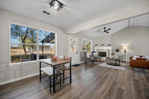 a living room with furniture and a table