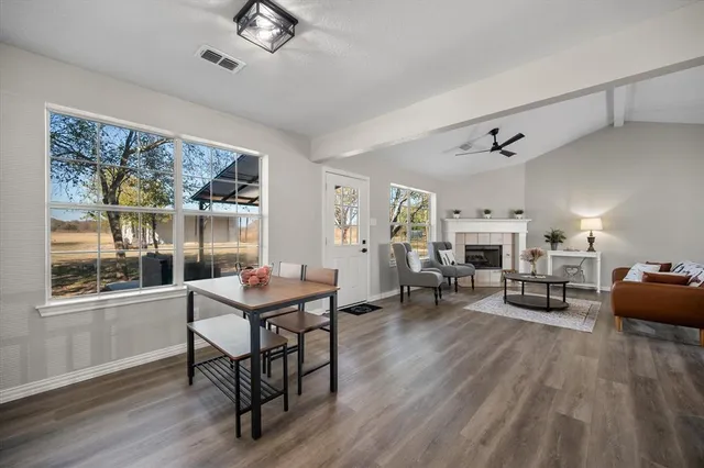 a living room with furniture and a table