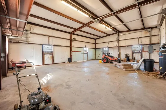 a view of parking garage with cars