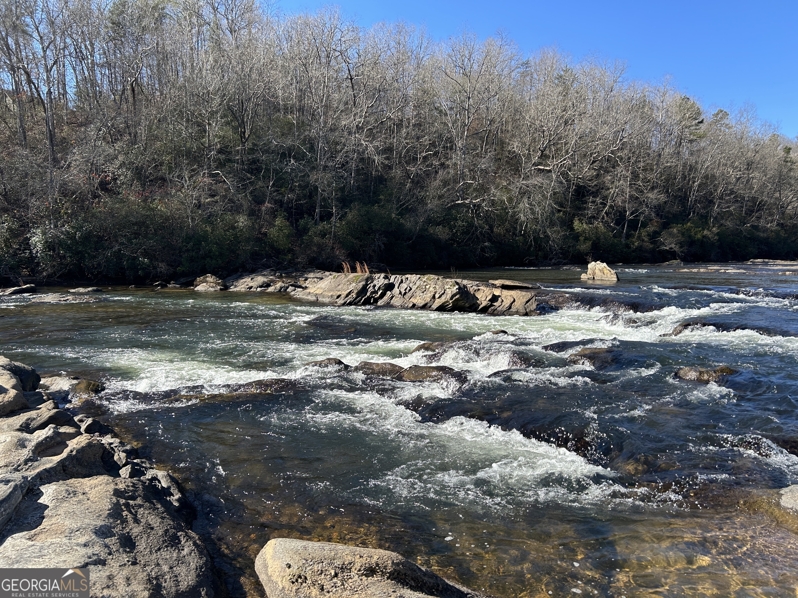 a view of a lake with houses
