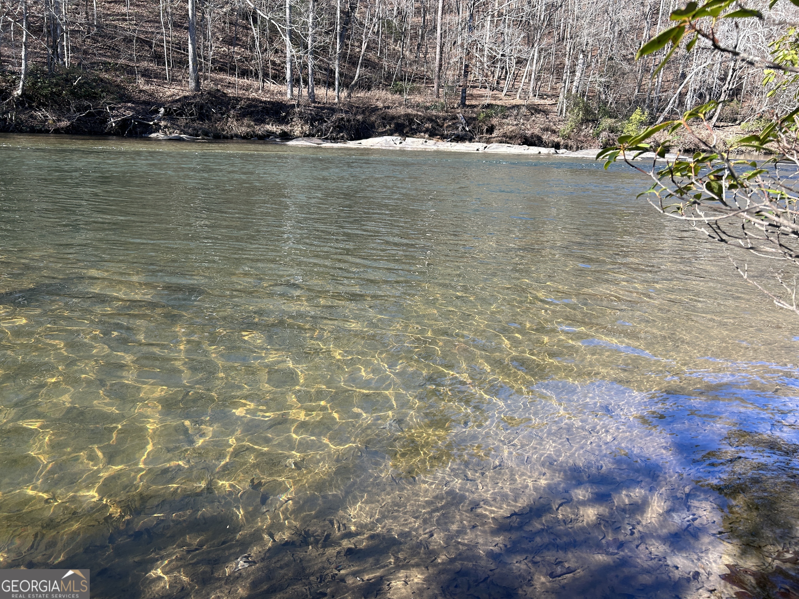 0 Twin River Orchard Road, Unit TRACT 1 Demorest, GA 30535 - Photo 44 of 63 a view of a water with a building in the background