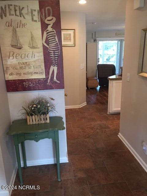 3030 Marsh Winds Circle, Unit 102 Southport, NC 28461 - Photo 2 of 18 Foyer