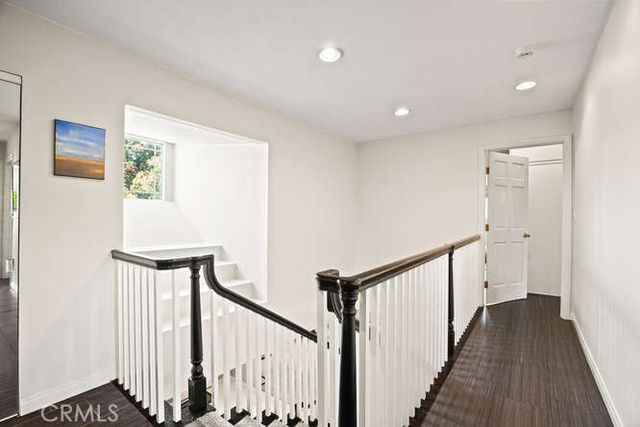 a bathroom with a shower and a toilet