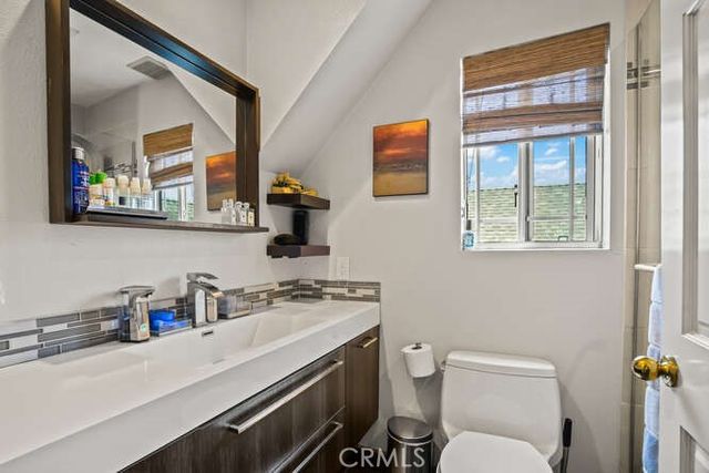 a view of a house with swimming pool and porch