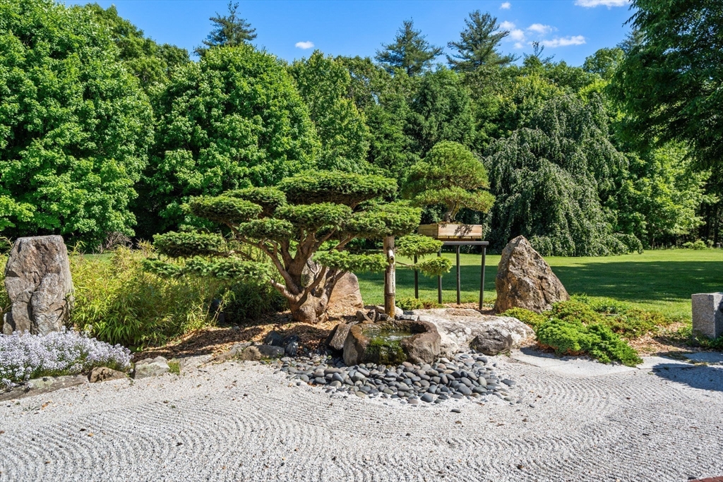 495 Hugh Cargill Road Concord, MA 01742 - Photo 15 of 42 a view of a park with a bench