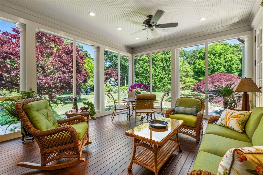 495 Hugh Cargill Road Concord, MA 01742 - Photo 30 of 42 a living room with furniture and a large window