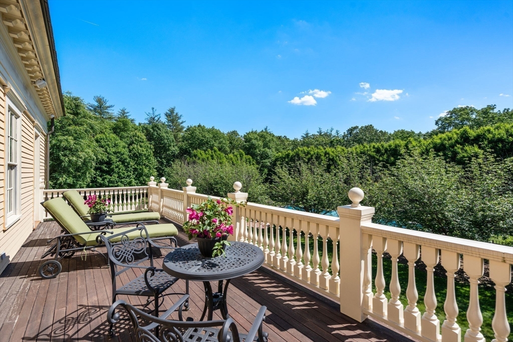 495 Hugh Cargill Road Concord, MA 01742 - Photo 33 of 42 a view of a chairs and table in patio