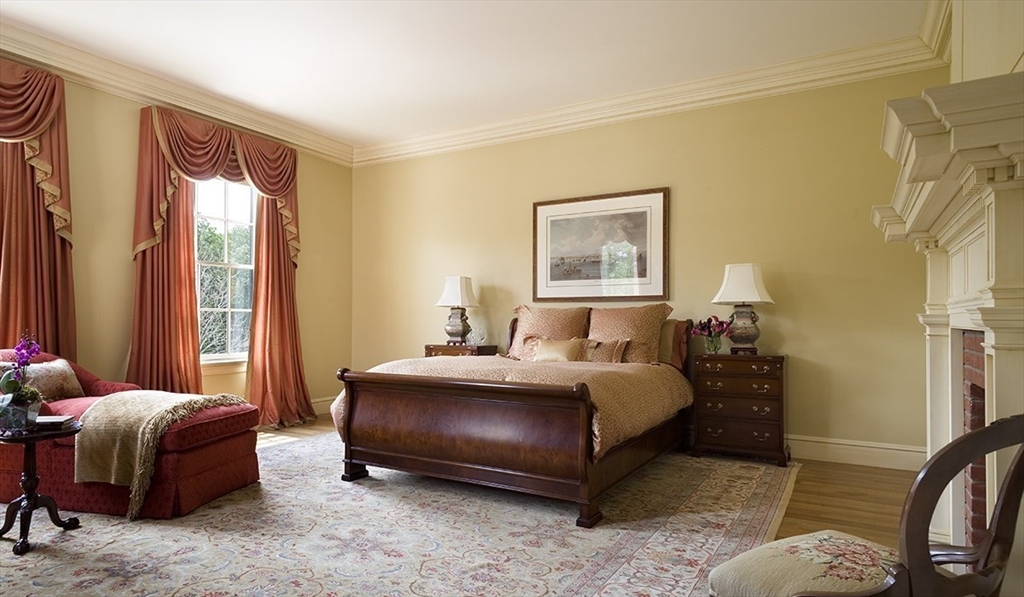 495 Hugh Cargill Road Concord, MA 01742 - Photo 38 of 42 a bedroom with a bed and a couch