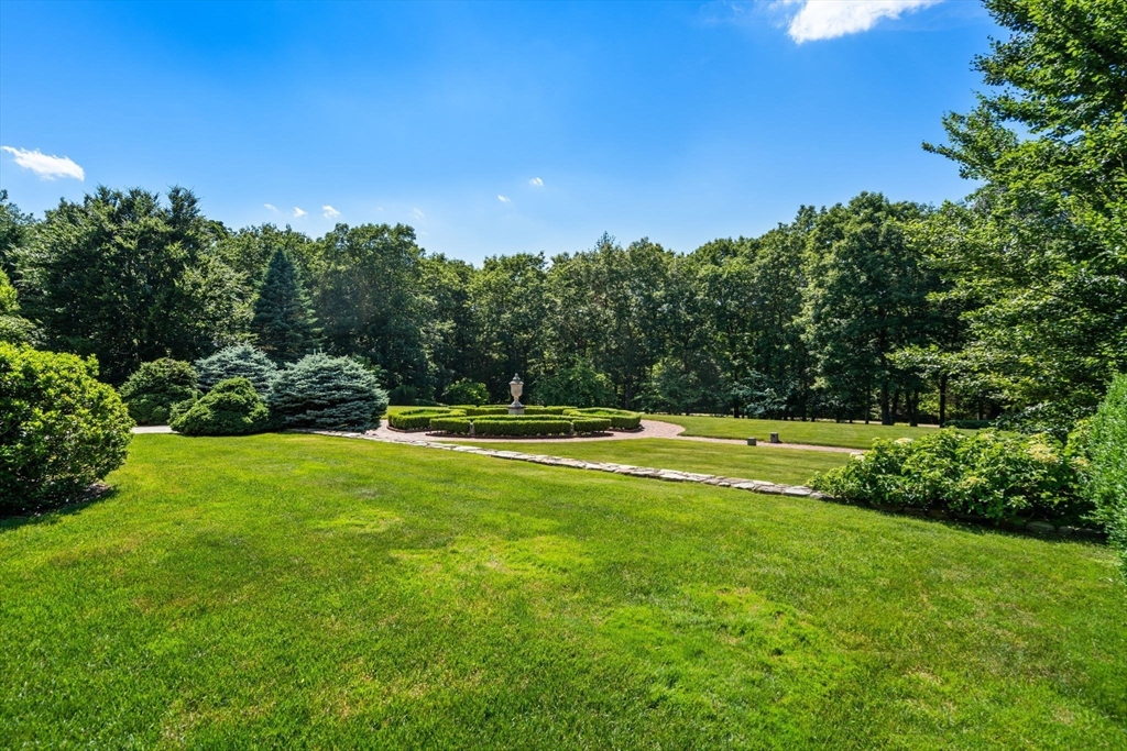 495 Hugh Cargill Road Concord, MA 01742 - Photo 6 of 42 a view of a green field