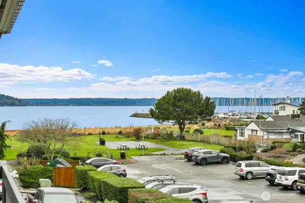 a view of parking with cars parked