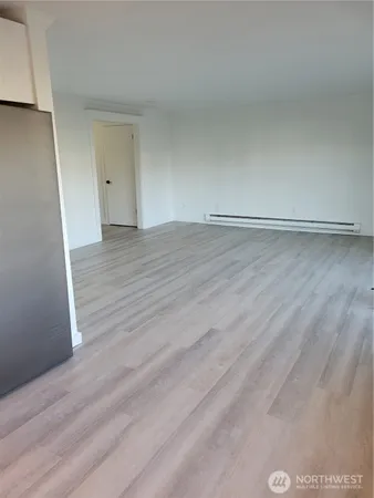 a kitchen with stainless steel appliances a refrigerator and a sink
