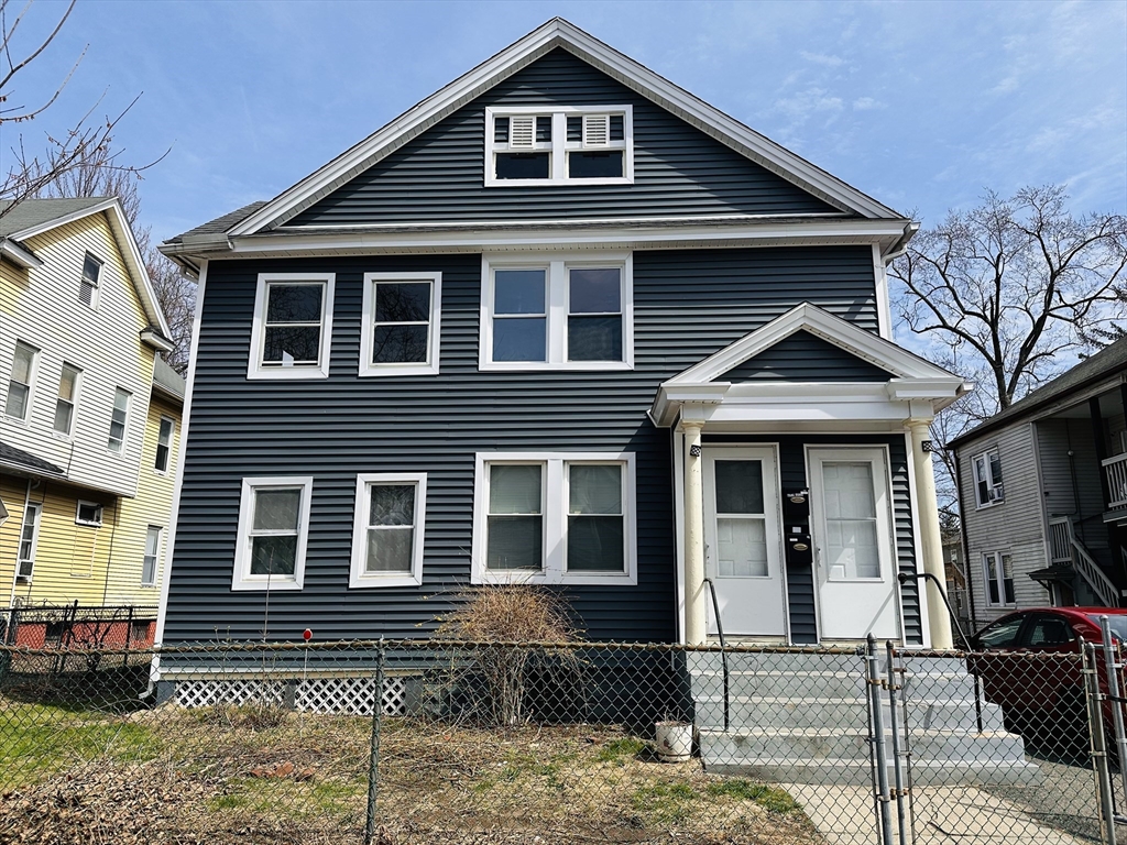 35-37 Suffolk Street Springfield, MA 01109 - Photo 1 of 17 a front view of a house with garden