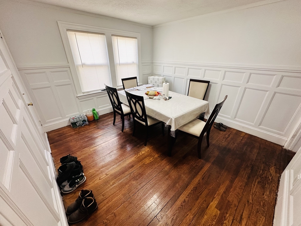 35-37 Suffolk Street Springfield, MA 01109 - Photo 4 of 17 a view of a workspace with furniture window and wooden floor
