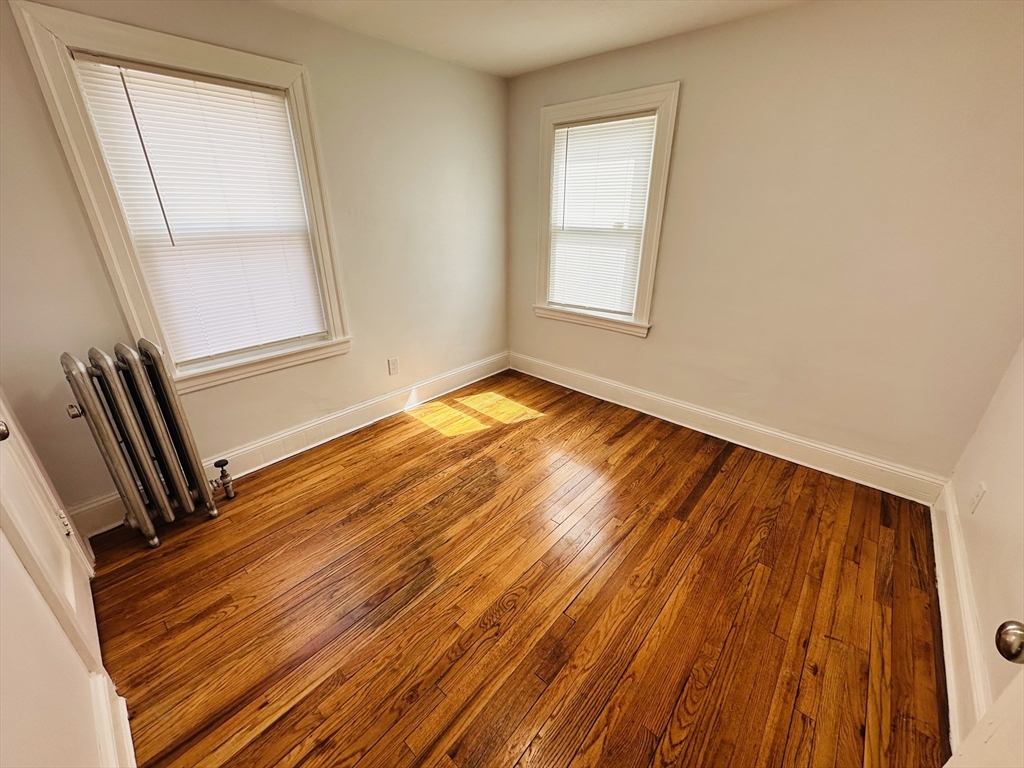35-37 Suffolk Street Springfield, MA 01109 - Photo 7 of 17 a view of an empty room and a window