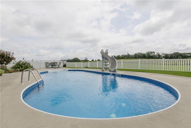 302 Barbara Spears Road Morrison, TN 37357 - Photo 16 of 16 a view of a swimming pool with a lake