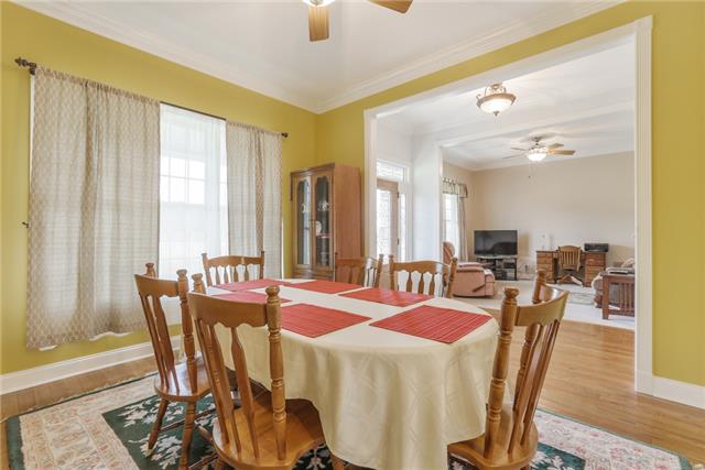 302 Barbara Spears Road Morrison, TN 37357 - Photo 8 of 16 a dining room with furniture window and wooden floor