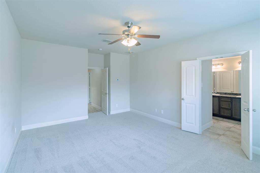 516 Hunt Farms Road Fate, TX 75189 - Photo 25 of 40 Recessed lighting, ceiling fan, plush carpet flooring, two-panel interior doors, and tile flooring