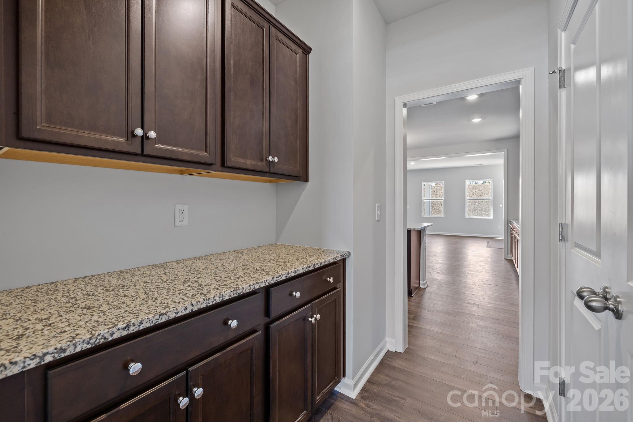 454 Brick House Road York, SC 29745 - Photo 11 of 35 a view of a kitchen cabinets and wooden floor