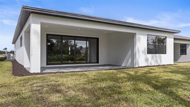 a view of a backyard of a house