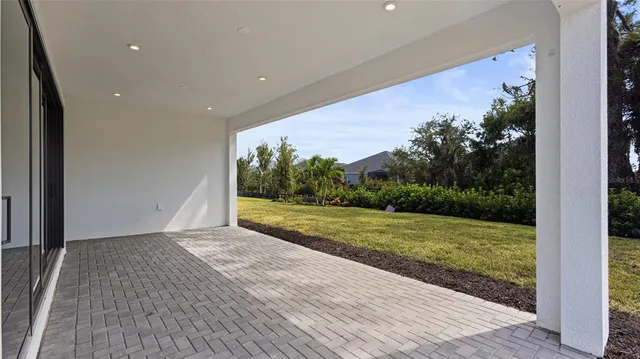 a view of a yard from a balcony