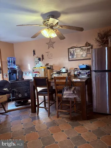 a view of a dining room with furniture