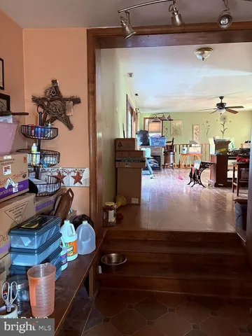 a living room filled with furniture and a couch