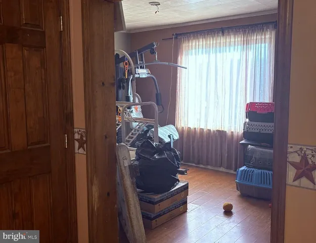 a bedroom with a bed and a closet