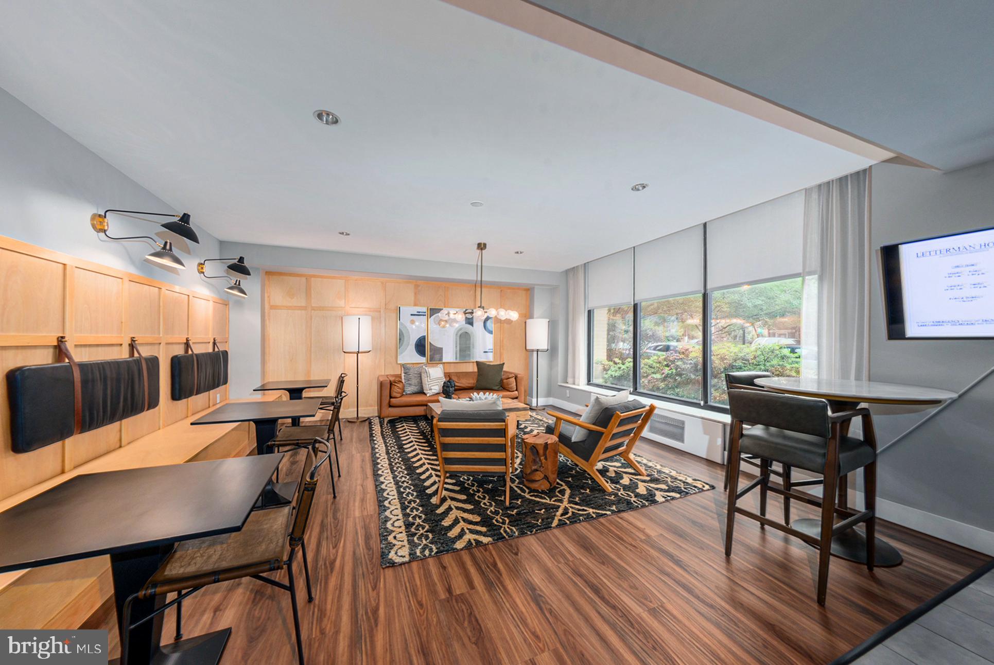 2030 F Street Northwest, Unit 209 Washington, DC 20006 - Photo 2 of 5 a view of a dining room with furniture window and outside view