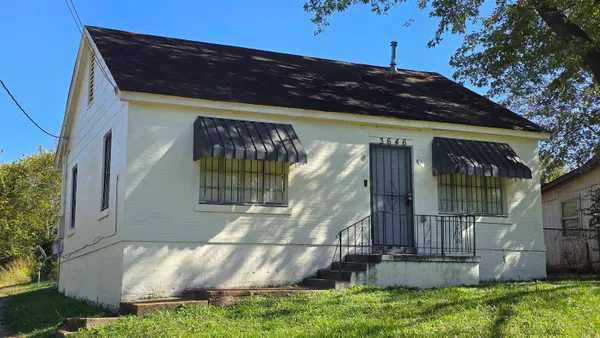 front view of house with a yard