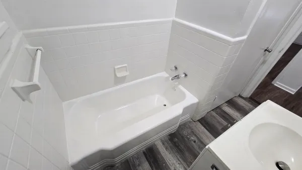 a bathroom with a sink and toilet
