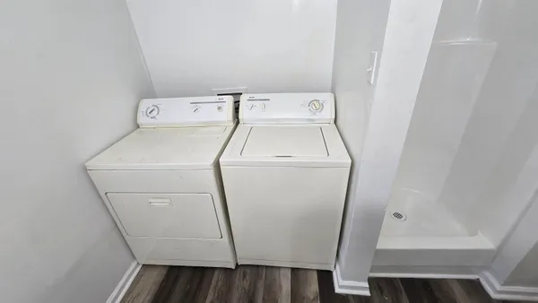 a utility room with dryer and washer