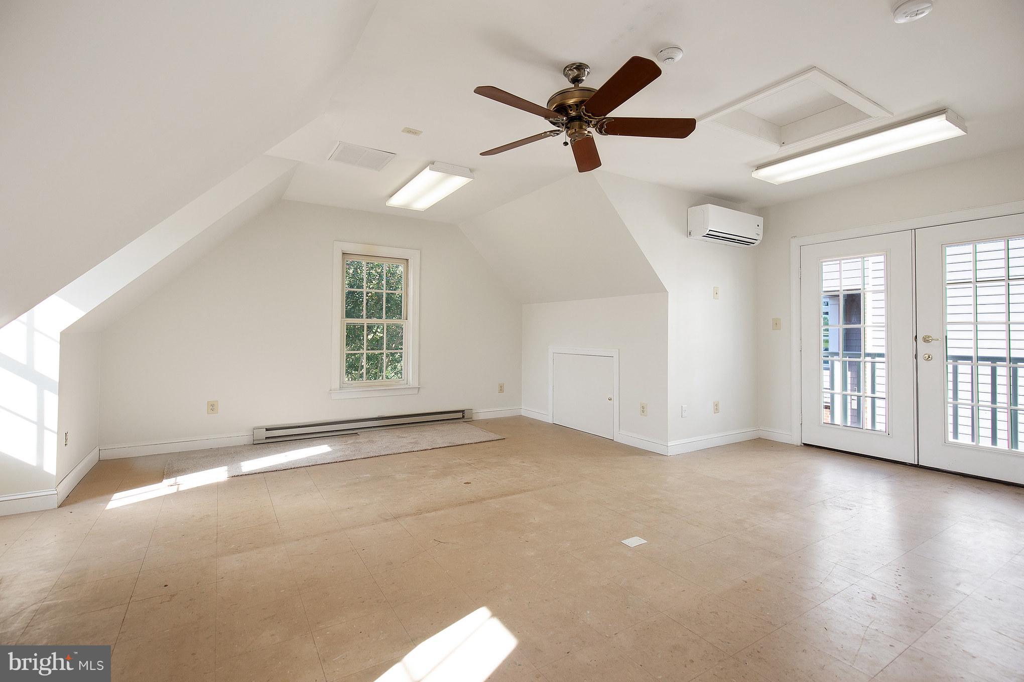 14270 Solomons Island Road South Solomons, MD 20688 - Photo 30 of 30 a view of a livingroom with a ceiling fan and window