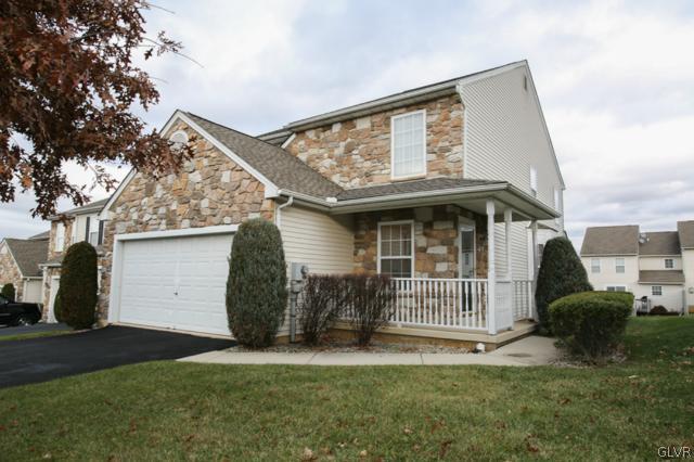 4162 Walter Road Bethlehem, PA 18020 - Photo 1 of 35 a front view of a house with a garden and plants