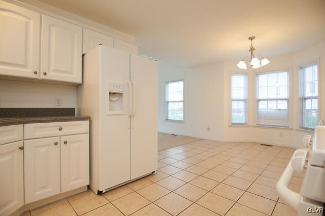 4162 Walter Road Bethlehem, PA 18020 - Photo 14 of 35 a view of a kitchen with white cabinets