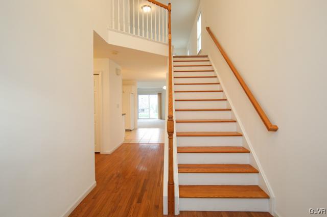 4162 Walter Road Bethlehem, PA 18020 - Photo 26 of 35 a view of a hallway with wooden floor and entryway