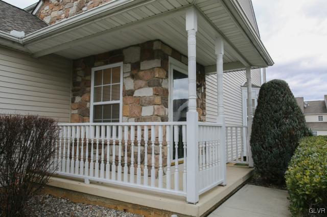 4162 Walter Road Bethlehem, PA 18020 - Photo 3 of 35 a view of a brick house with a small yard