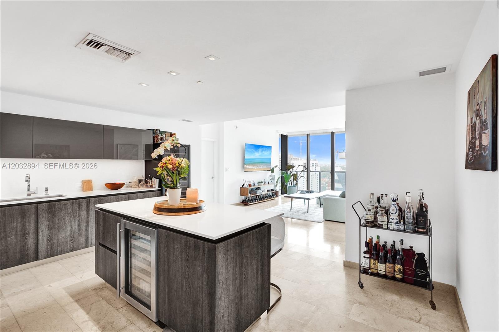 88 Southwest 7th Street, Unit 2210 Miami, FL 33130 - Photo 4 of 24 Flexible den/dining area connecting to the open living and kitchen layout.