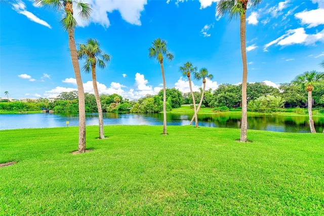 a bathroom with a tub and a mirror