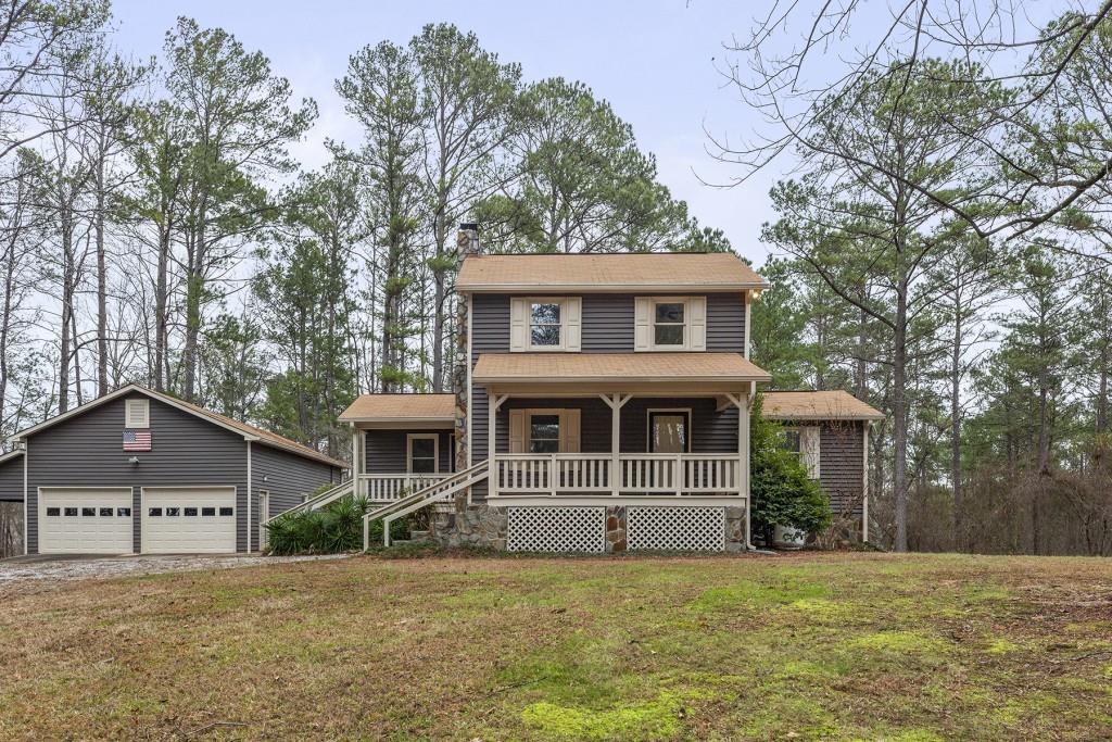front view of a house with a yard